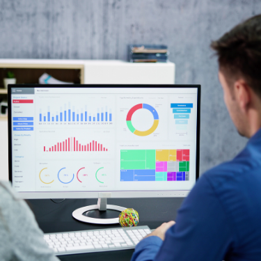 A person looking at dashboards